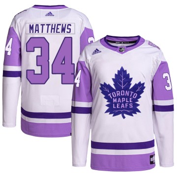 Authentic Adidas Men's Auston Matthews Toronto Maple Leafs Hockey Fights Cancer Primegreen Jersey - White/Purple