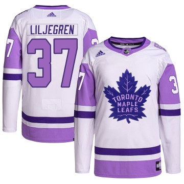 Authentic Adidas Youth Timothy Liljegren Toronto Maple Leafs Hockey Fights Cancer Primegreen Jersey - White/Purple